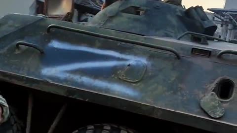 DNR using an APC to evacuate civilians trapped in Mariupol