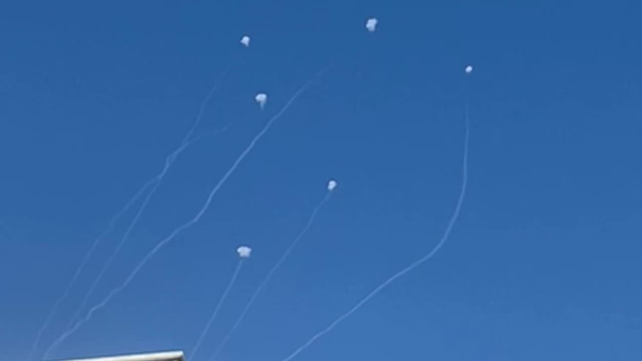 Israeli air defense attempting to intercept a barrage of rockets fired toward Acre and Haifa Bay