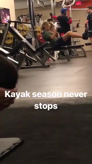 Kayak season never stops man moving weights like kayak