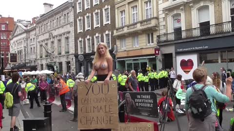 topless protester Extinction rebellion 23 Aug 2021