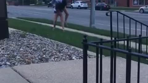 Two guys trying to do between the leg front flip fails face plant into grass