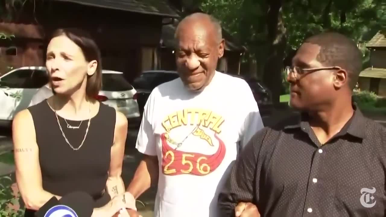 Bill Cosby appearing alongside lawyers at his home on Wednesday...