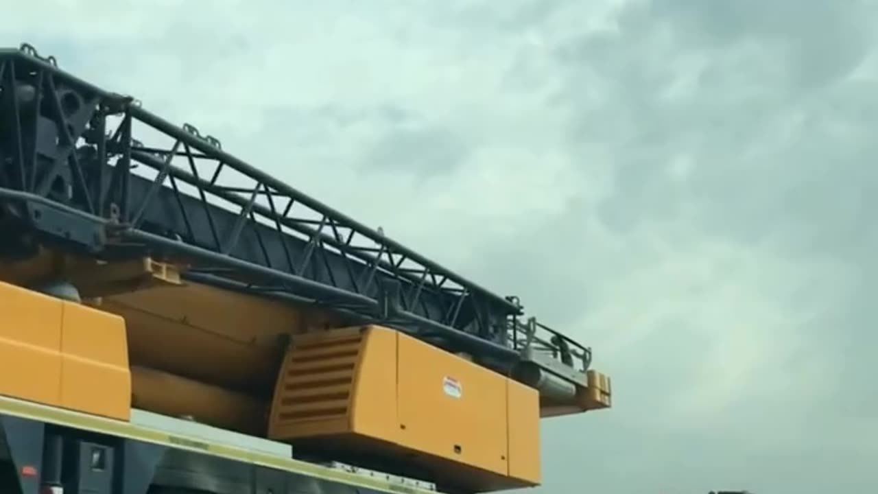 Epic Crane in Motion! Lowboy Trailer Shipping Unleashed!
