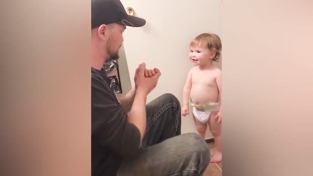 Funny Baby Playing With Daddy - JustSmile