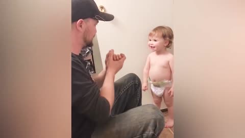 Funny Baby Playing With Daddy - JustSmile