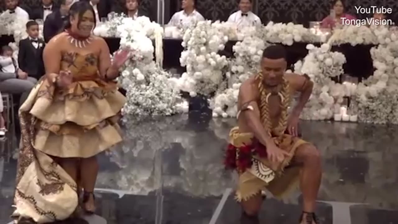 tephen Crichton dances with partner Leone Lauafia at wedding
