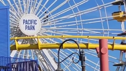 The Santa Monica Pier has been evacuated after a man claiming to have bomb climbed onto Ferris wheel