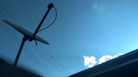 UFO in the blue sky