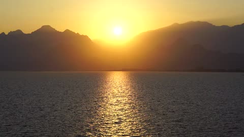 Silhouette Of Mountains At Sunset