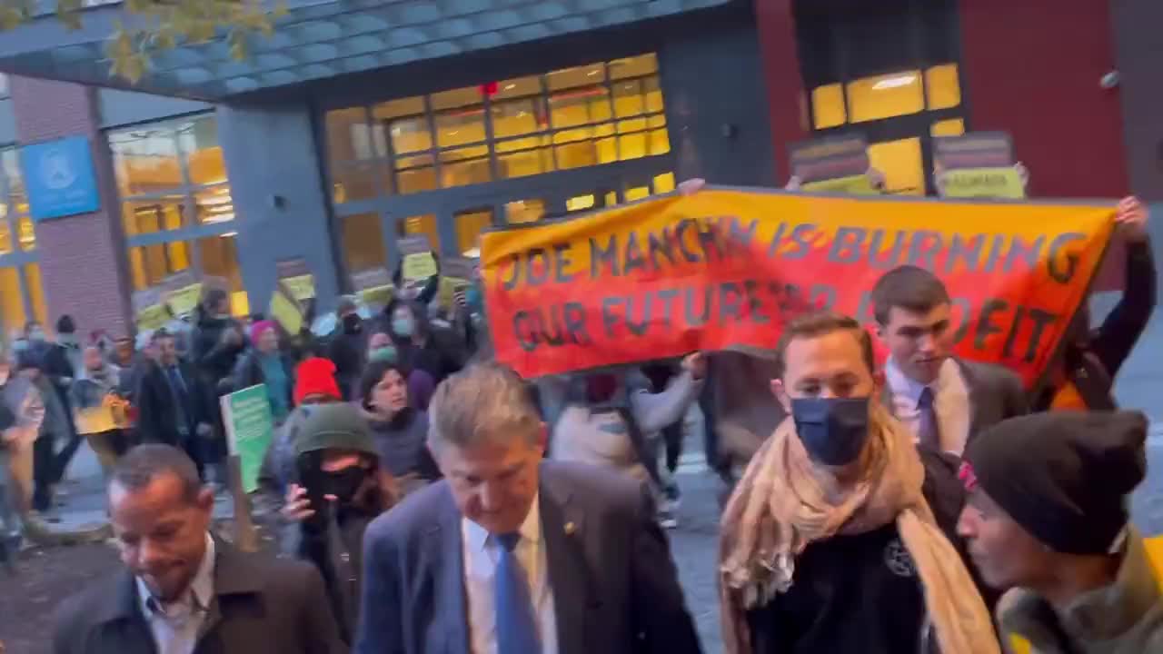 Mob of "climate activists" confronted Democrat Sen. Manchin for opposing Biden's Build Back Better