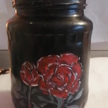 Acrylic painted glass jar with red flowers