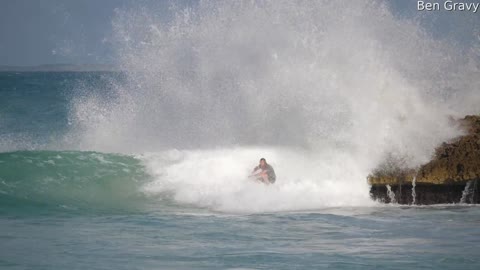 Surfer Makes a Tight Squeeze