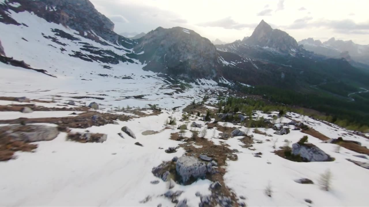 Drone Footage Of A Mountain Landscape With Snow