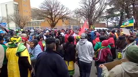 Supporters from different political parties gather at the Krugersdorp Magistrate court