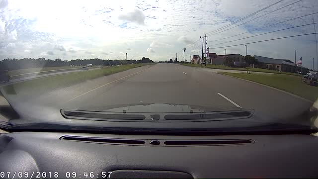 Roadside Worker Throws Trash, Nearly Hit by Car