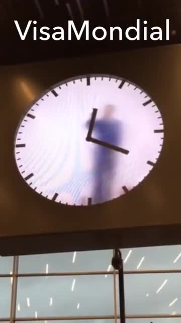 A New Clock at Amsterdam’s Airport Features a Man Painting the Minutes by Hand