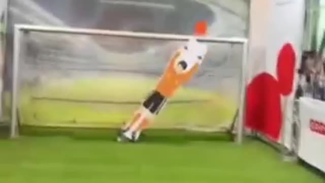 Messi's shot is saved by the robot goalkeeper