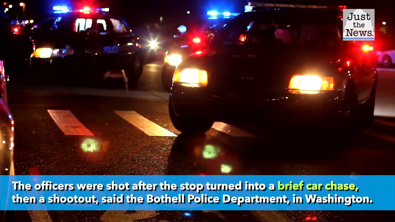 Two police officers shot, one killed