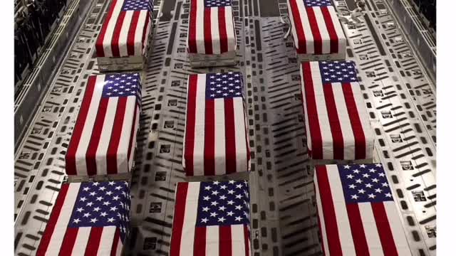 Marine coffins draped with flag