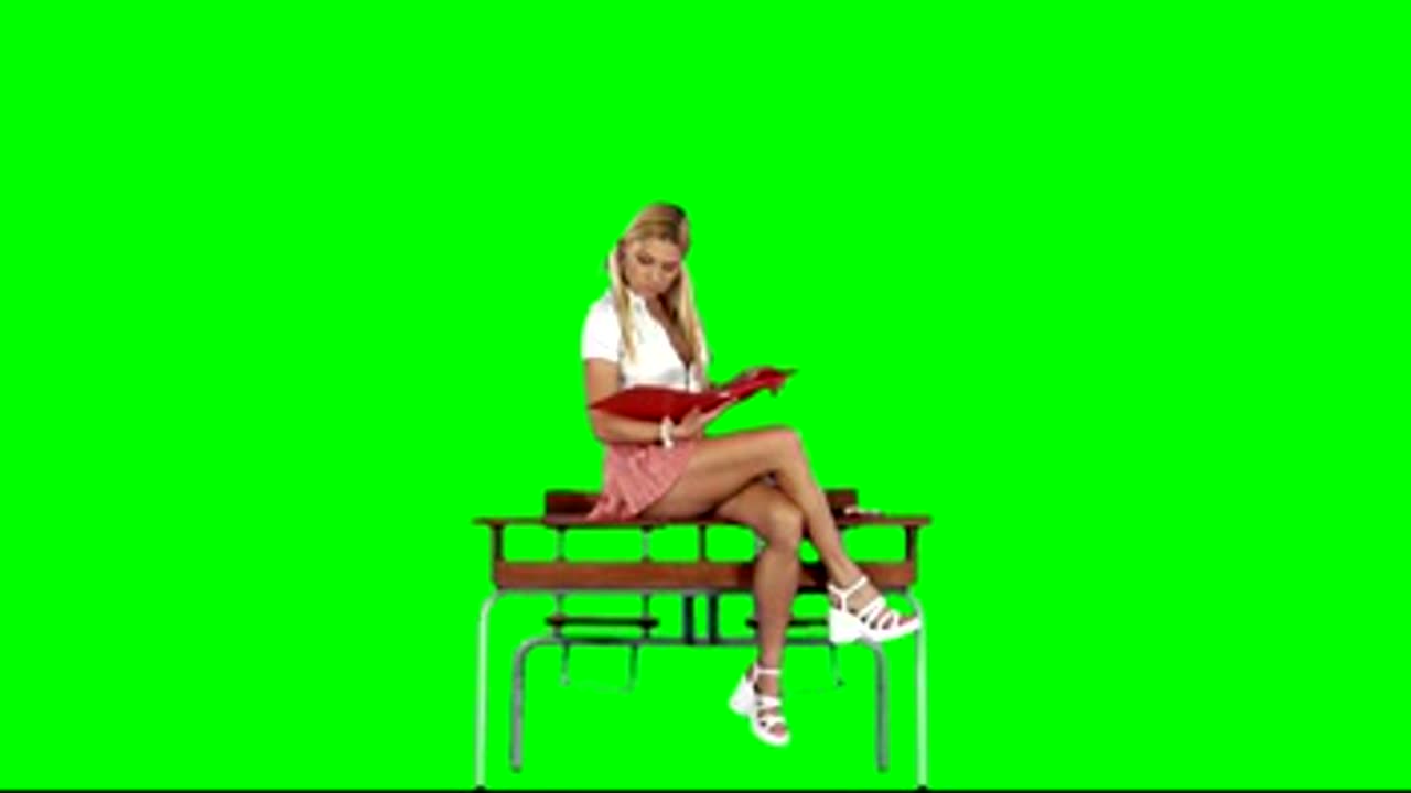 Desk, blonde, footage on chromakey for video editing