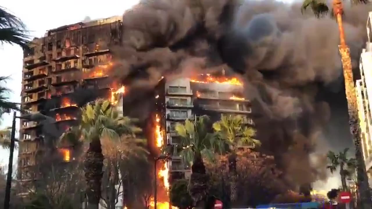 New: An entire multi-story building is on fire in Valencia, Spain.