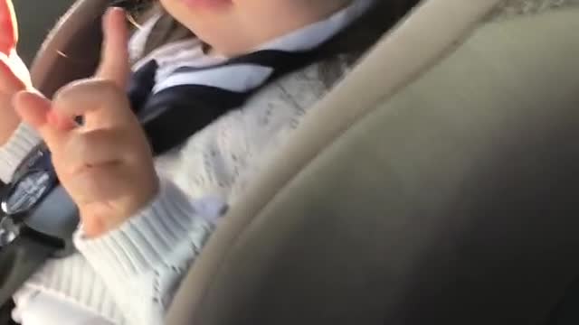 Toddler waiting for the beat drop