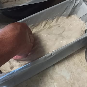 Shaping loafs of bread with warm water