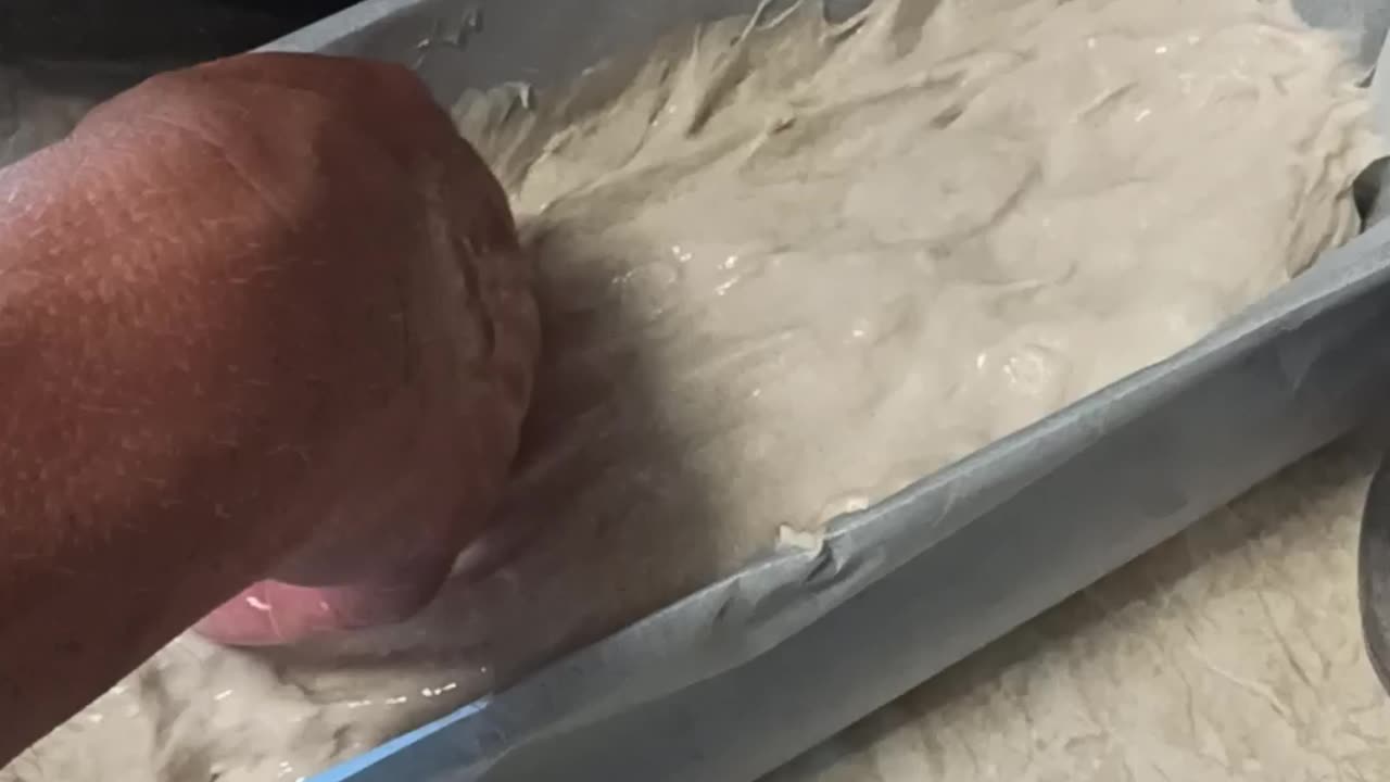 Shaping loafs of bread with warm water