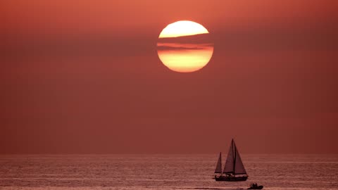 Spectacular Moments: Boats and Sunset