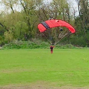 Parachutist comes in hot, landing at Hamilton Airport