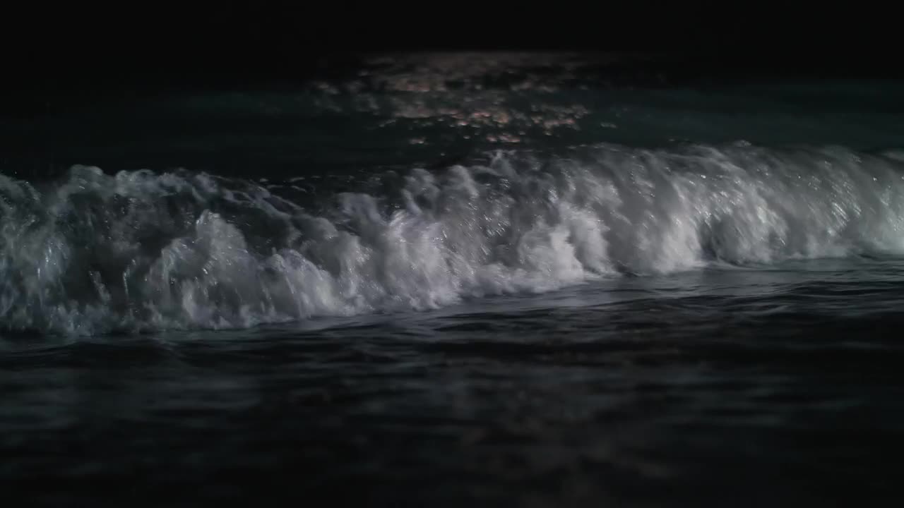 Sea waves washing against the shore