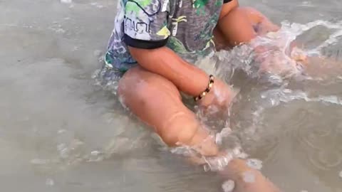 Baby's first time at the beach