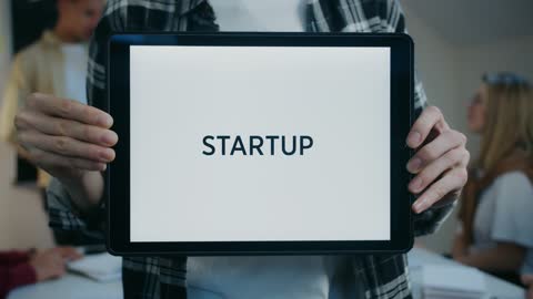 A Person Holding a White Board