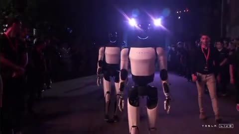 Elon, unveils squad of Optimus robots