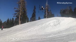 Grey jacket man skiing lost control falls