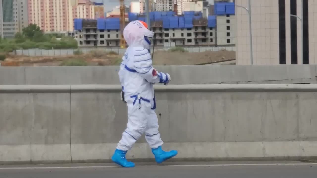 Cosmonaut walking on the City street😂