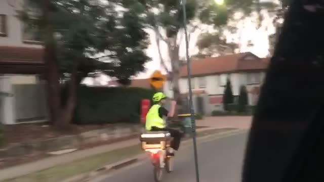 Dominoes Pizza Delivery on Bike