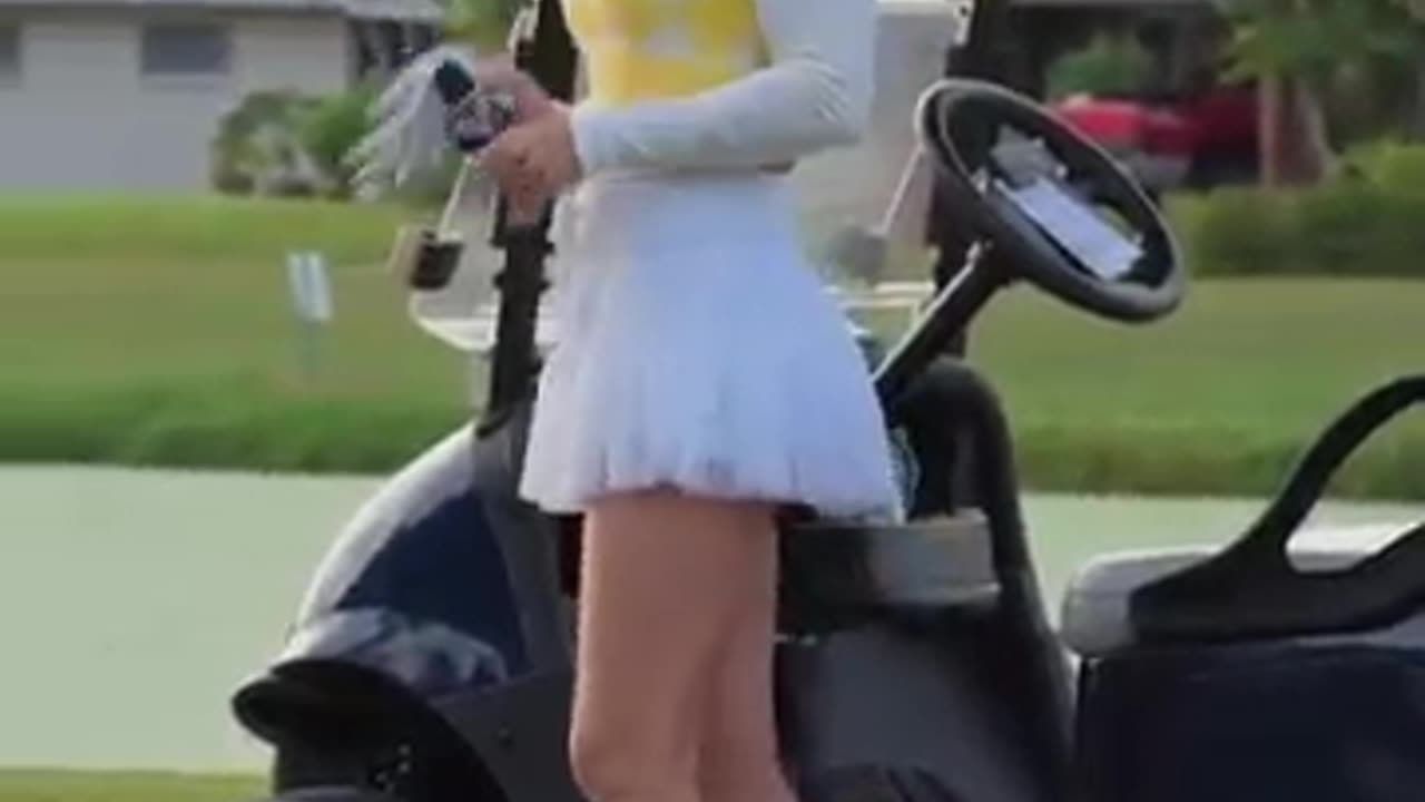 Karin Hart's sweater goes hard #golf #golfer #sweater #hard #swing #shot #player #green #fairway