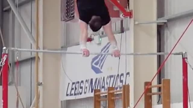 Farthest backflip between horizontal bars: 5.87 m(19 ft 3.1 in) by Ashley Watson