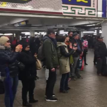 Buff shirtless man wants big band in subway