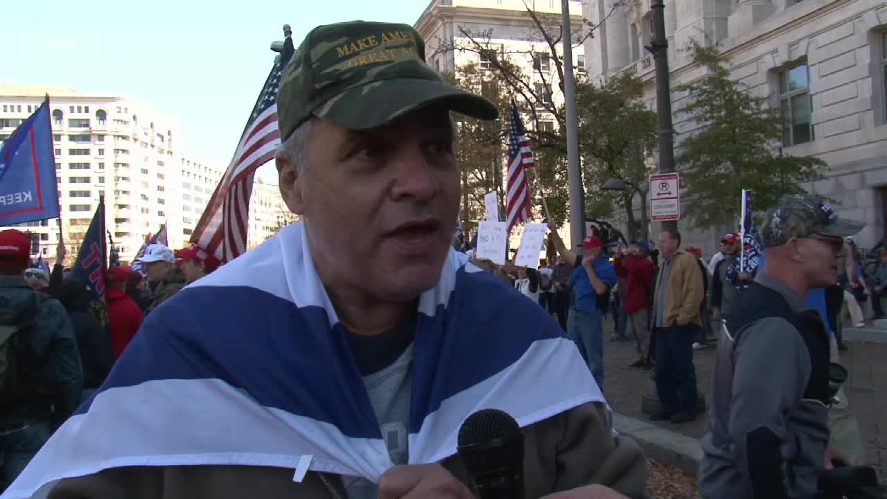 Nuclear Engineer Draped in Israeli Flag for Trump