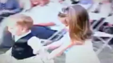 Ring bearer tosses pillow