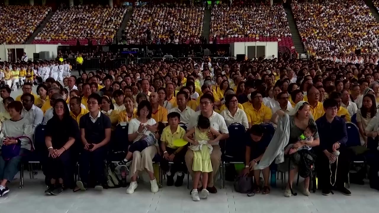 Pope Francis holds a Mass in Singapore's national stadium