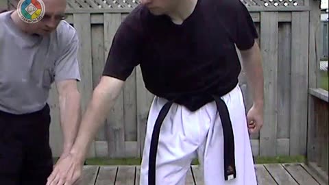 Baehr Taekwondo: white-belt-one-hand-holding-01-closeup