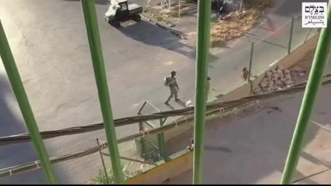 A Kid Playing with his Biclyle how sehoni forces teasing kids in the streets pf GAZA