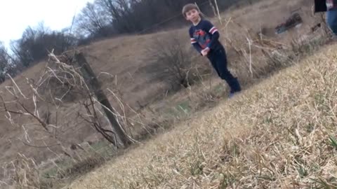 Kid Plays a Joke on Brother Touching Electric Fence