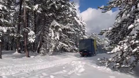 CAMPING WITH A CAMPER TRUCK WITH STOVE IN HEAVY SNOW