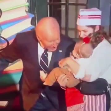 TOTALLY BIZARRE! Joe Biden repeatedly bites yet another Baby