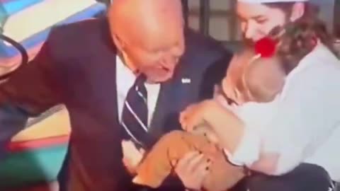 TOTALLY BIZARRE! Joe Biden repeatedly bites yet another Baby