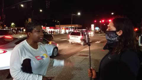 Brave Woman Wades Into The Middle Of Protesters To Tell Them To Stop What They're Doing